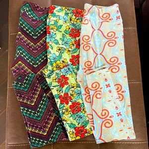 Three pairs of SZ LG LuLaRoe Tall and Cury Leggings Floral Paisley Geometric Fun